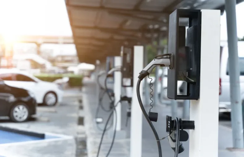 Electric cars on electric car charging station.