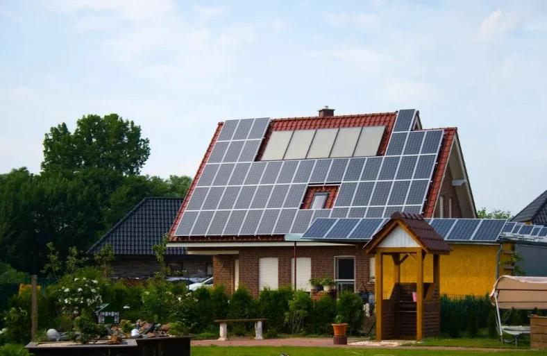 Rural residence with solar panels on a roof