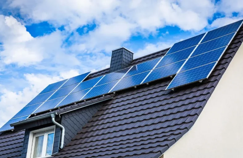 Solar photovoltaic panels on the roof of family house