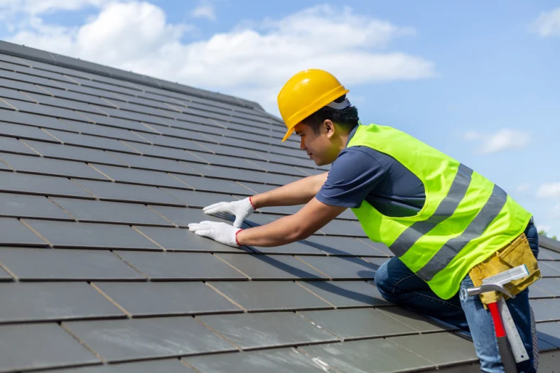 Installation expert mounting solar shingles