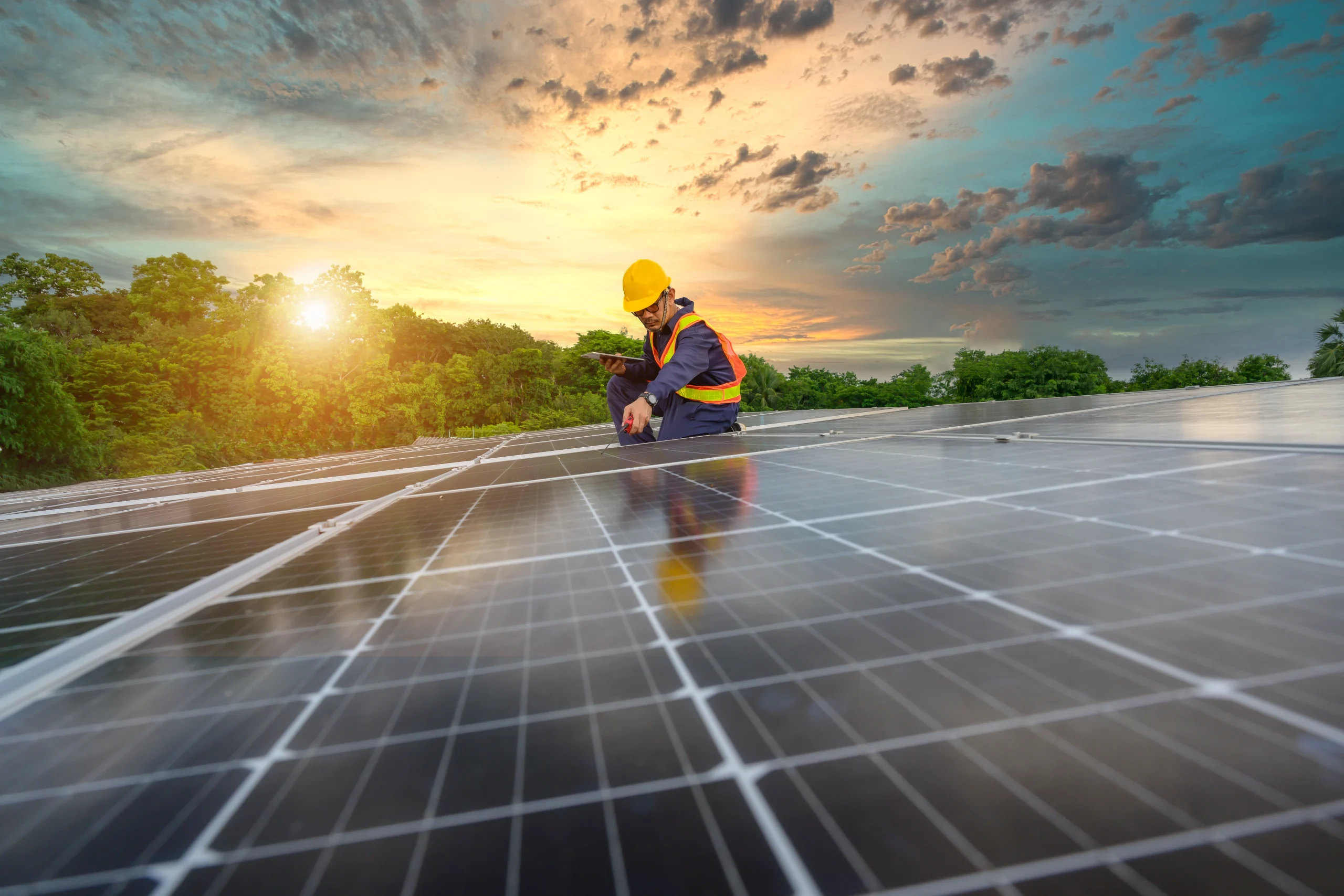 A maintenance technician checking assessing the installation site