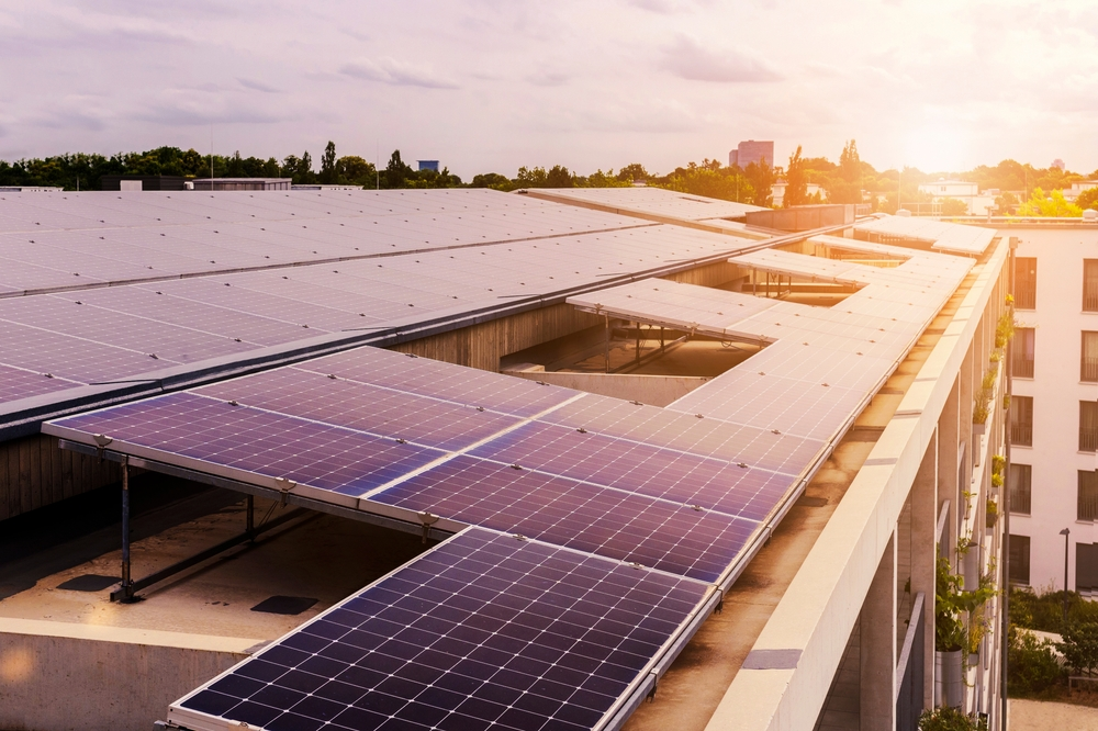 Solar photovoltaic installation on the roof of an apartment building.