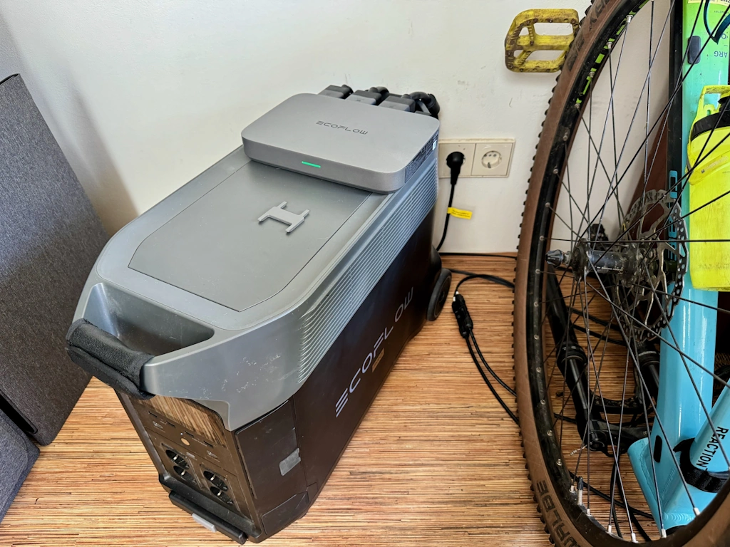 An EcoFlow PowerStream device placed on the apartment floor