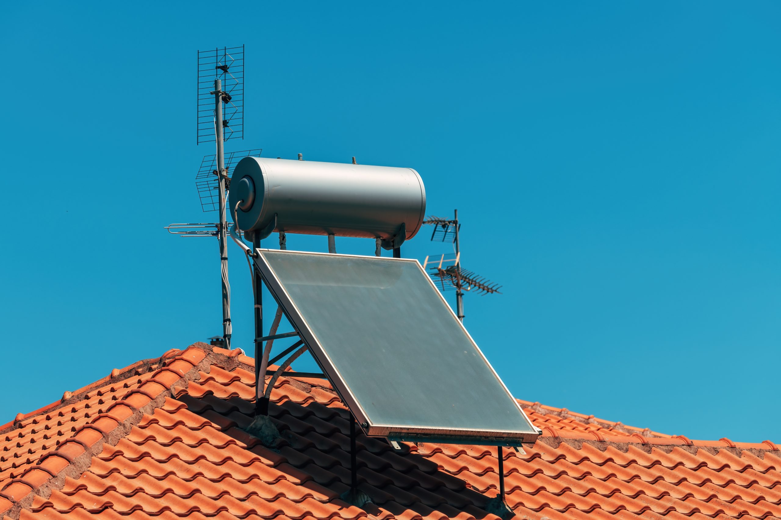 Solar panel water heater placed on the top of the house